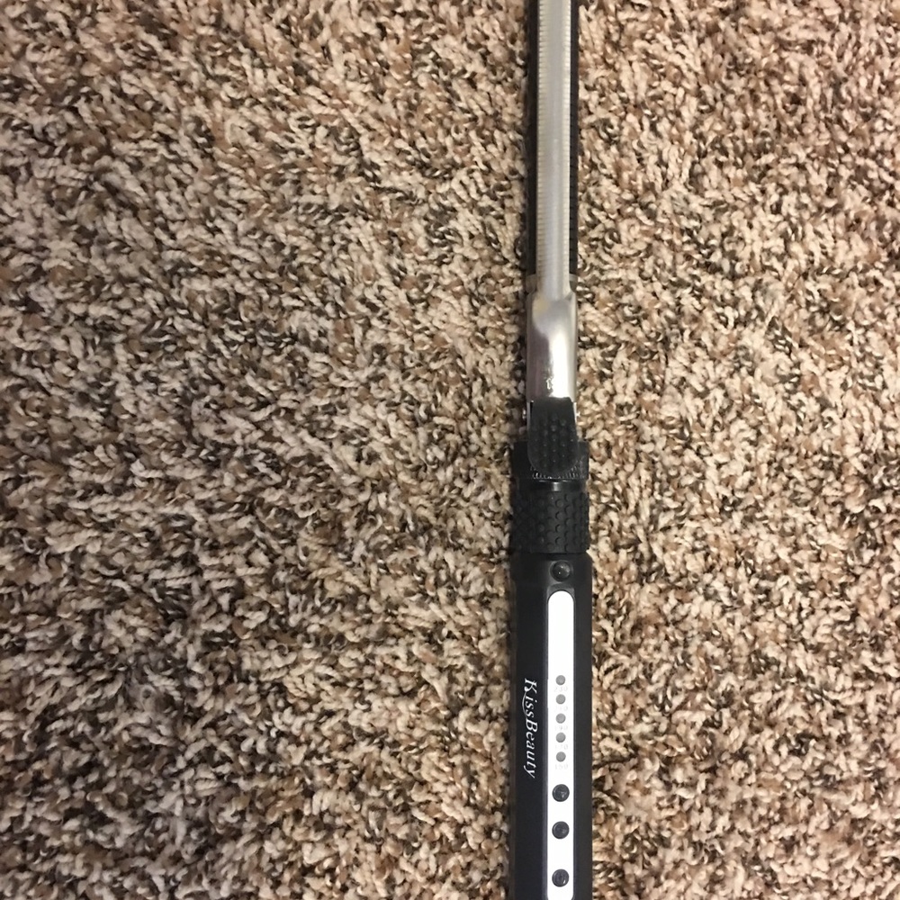 Rotating curling wand